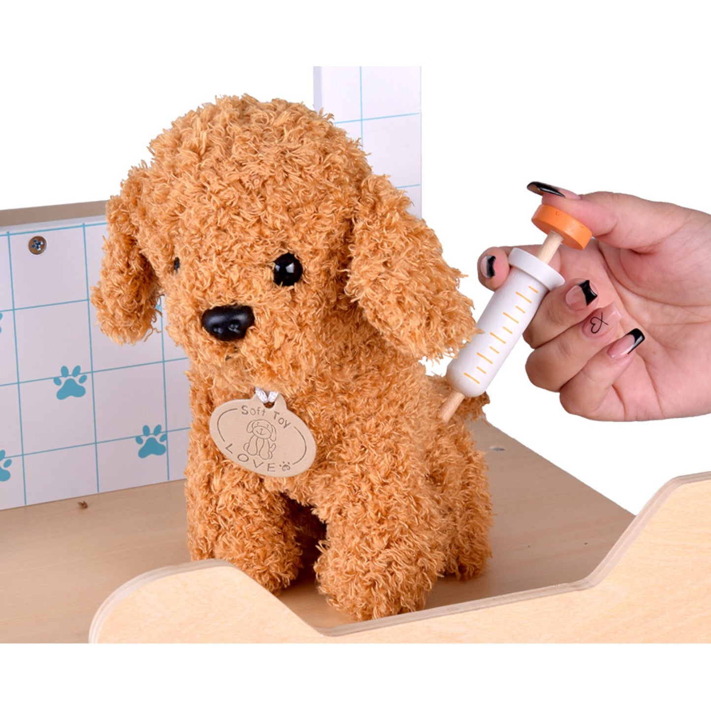 Плюшено куче в ръка – детска ветеринарна клиника GINGER HOME